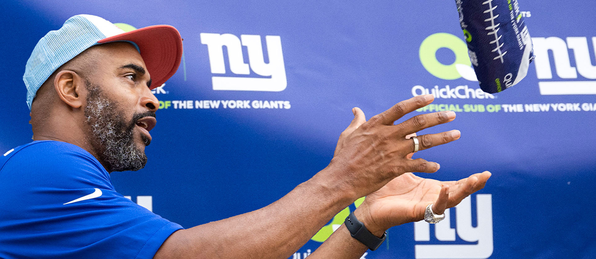 Event Marketing - New York Giants Legend David Tyree Catching a QuickChek Sub at Campaign Event